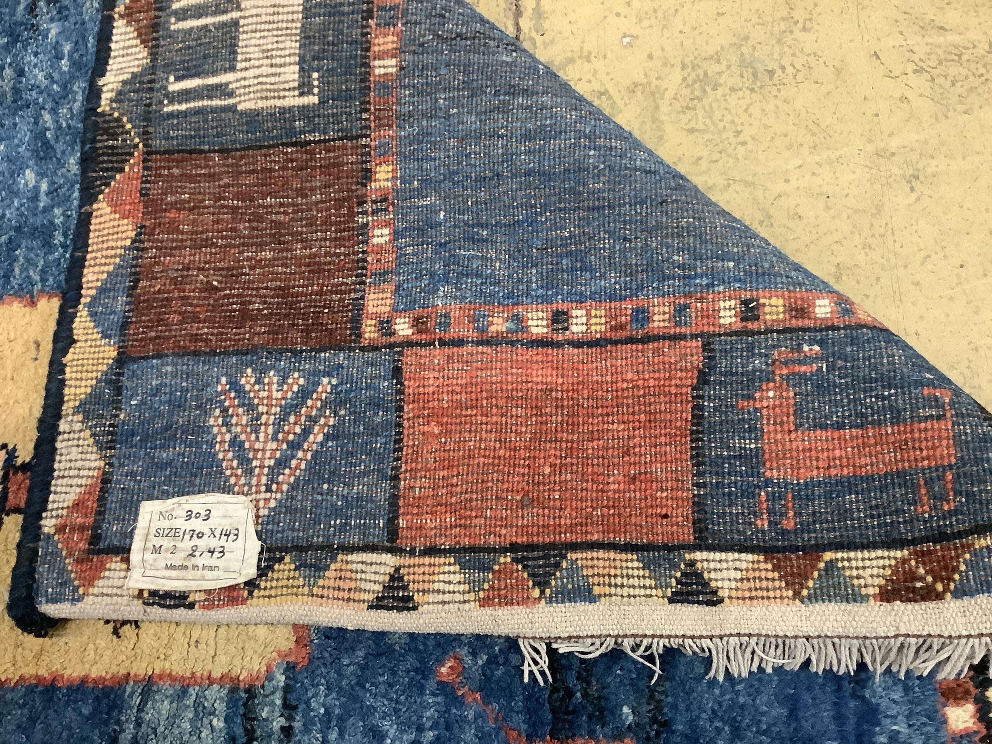 A Gabbeh blue ground carpet, 180cm x 148cm